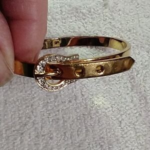 Goldtone juicy couture belt buckle crystal hinged bracelet
